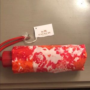 Coach never used umbrella